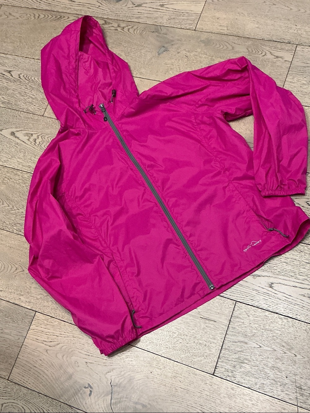 Woman’s Eddie Bauer pink windbreaker. XL. Front zip pockets. Hood. Gently worn.